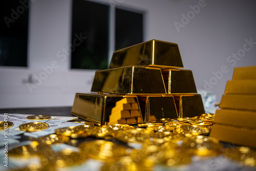 Gold bar stock photo, picture and photo on black table at night.