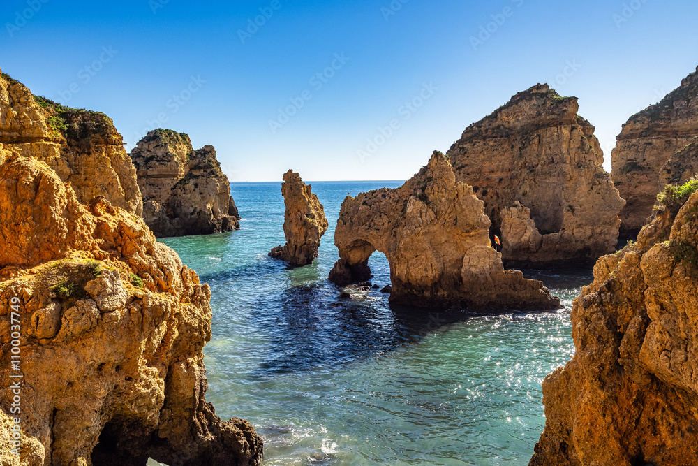 Fototapeta premium Ponta da Piedade is a unique rock formation with famous grottos in the ocean at Lagos, Algrave, Portugal