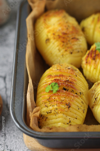 Hasselback potatoes - typical Swedish cuisine	 photo