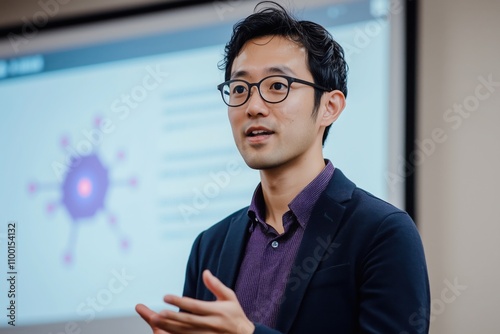 Asian teacher in professional attire and glasses presenting molecular structure with projector at scientific conference