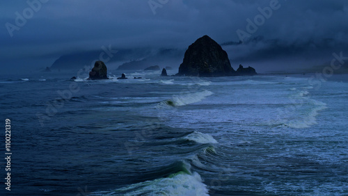 Rushing ocean waves on beautiful Oregon coast with rain storm