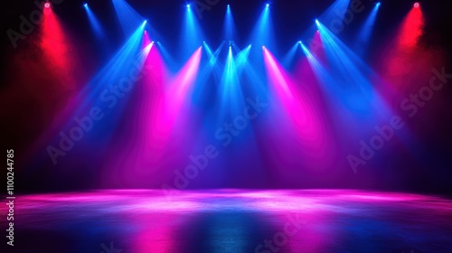 Stage lighting with blue and pink spotlights on a dark background.