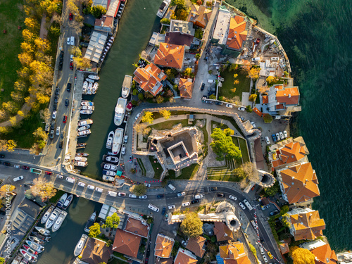 Aerial view of the beautiful Anatolian Fortress and Goksu Creek with scenic buildings and boats, Anadolu Hisari, Istanbul, Turkey. photo