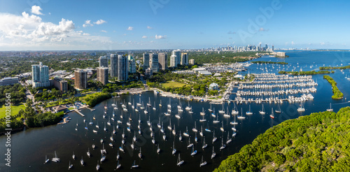 Aerial view of coconut grove marina with sailboats and cityscape, Coconut Grove, Florida, USA.
