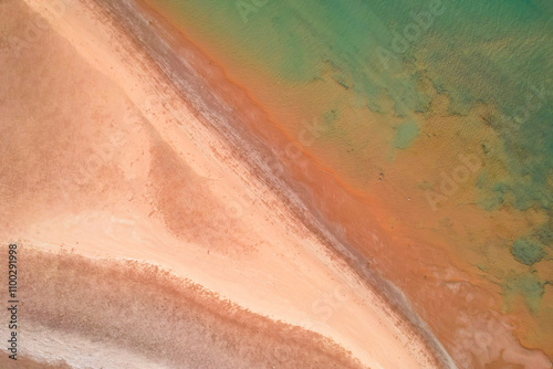 Aerial view of the serene Nullagine River with turquoise water and sandy beaches, Cossack, Australia. photo