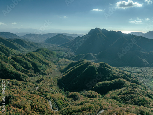 Aerial view of beautiful Mount Picentini in twilight with scenic valley and clouds, Giffoni Valle Piana, Italy. photo