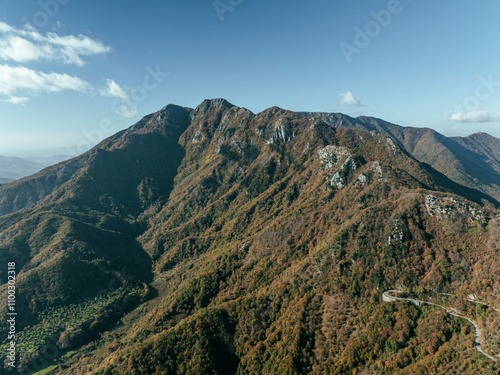 Aerial view of the majestic Mount Picentini in the serene National Park surrounded by rugged terrain and picturesque valleys, Giffoni Valle Piana, Italy. photo