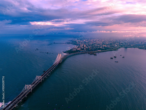 Aerial view of the beautiful Sealink bridge connecting the vibrant city of Mumbai to the Arabian Sea at sunset, Worli, India.