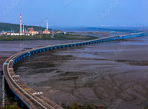 Aerial view of Atal Setu bridge over the Arabian Sea with beautiful buildings and clear sky, Sewri, Mumbai, India. photo