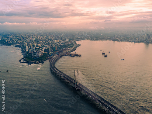 Aerial view of beautiful Worli Sealink bridge with a stunning skyline and Arabian Sea at sunset, Mumbai, India. photo