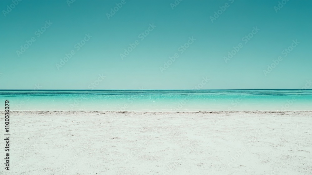 Fototapeta premium Tranquil Beach with Clear Water and Cloudless Blue Sky