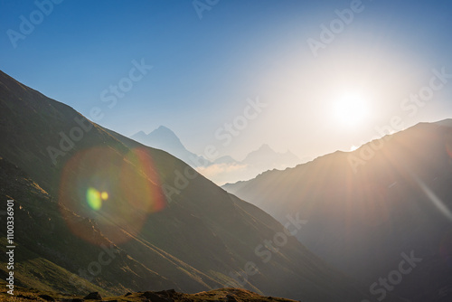 View en route to Rupin pass trekking trail near the viewpoint of  sacred Kinner Kailash peak. It is a high altitude trek in Himachal Pradesh with Himalayan ranges, glacial meadows. photo