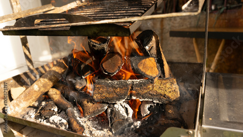 pieces of meat of various kinds are grilled on a grill where care must be taken so that they are neither overcooked nor undercooked