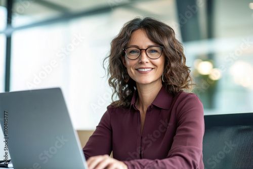 Smiling portrait professional it specialist latin hispanic business lady working on laptop pc sitting in modern office. Young middle eastern indian woman using computer technology for work. Copy space Free Download Smiling portrait professional it specialist latin hispanic business lady working on laptop pc sitting in modern office. Young middle eastern indian woman using computer technology for work. Copy space - GFXLoad