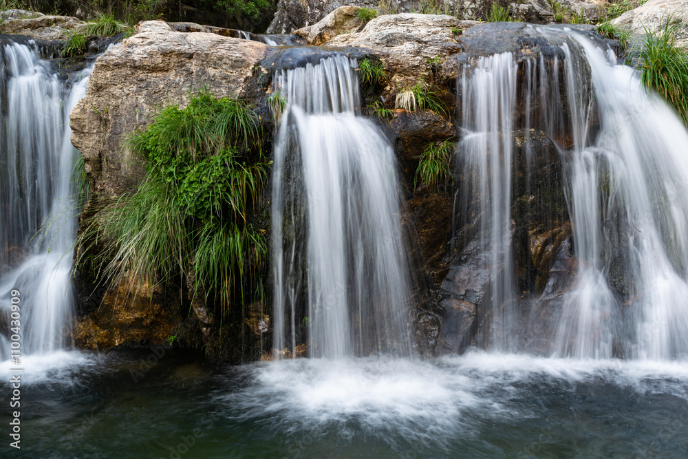 Obraz premium Picturesque view of a waterfall in the forest in Loureza - Galicia