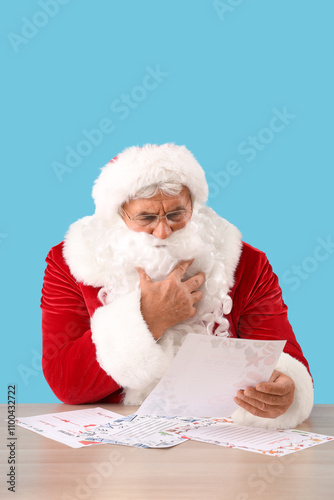 Santa Claus reading letter ...