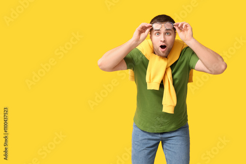 Shocked young man in eyegla...