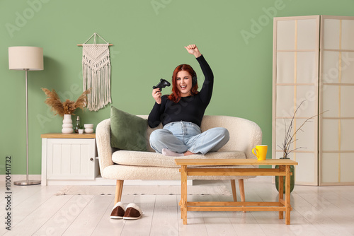 Young woman in headphones p...