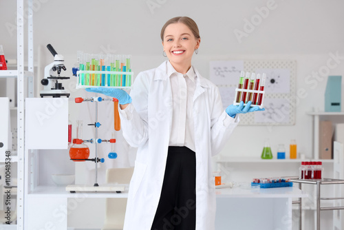 Female chemist with test tu...