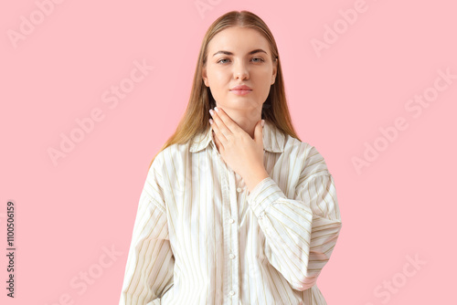 Young woman self-examining ...