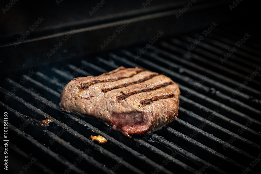 Juicy steak Meat Roasted BBQ Grill. Steak beef Grilled On Hot Barbecue Charcoal Flaming Grill. Grill Dish Closeup View. Juicy steak Meat Roasted BBQ Grill. Steak beef Grilled On Hot Barbecue Charcoal Flaming Grill. Grill Dish Closeup View.