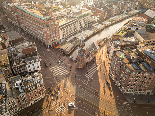 Canals of Amsterdam as seen from above with a drone. Drone photography of European cities. Amsterdam, Netherlands at sunset photo