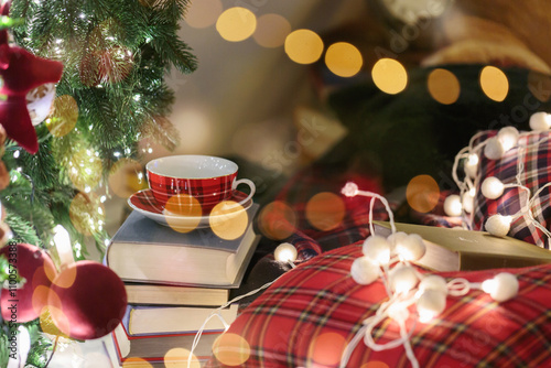 A detailed Christmas tree decorated with red velvet ornaments, glowing string lights, and cozy plaid elements, creating a warm and festive holiday atmosphere. photo