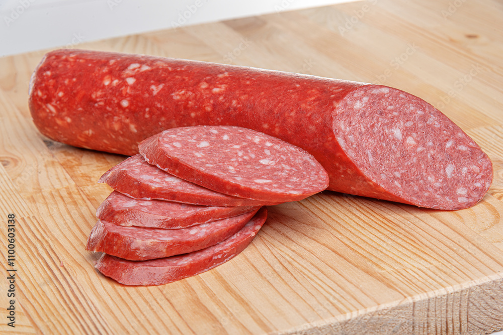 Sausage stick on wooden background. Pork beef sausage.