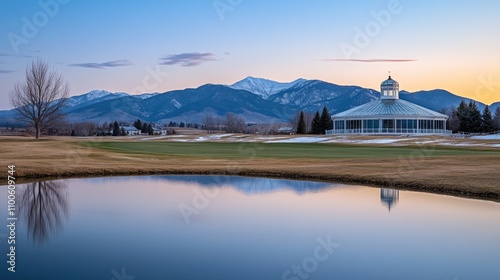 Early spring morning showcases Taft Pavilion at Rosel Clear Lake, with still waters reflecting the structure and blue skies amidst gentle clouds photo