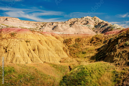 Rugged multi color plains, mountains and valleys of Badlands National Park near Wall, South Dakota photo