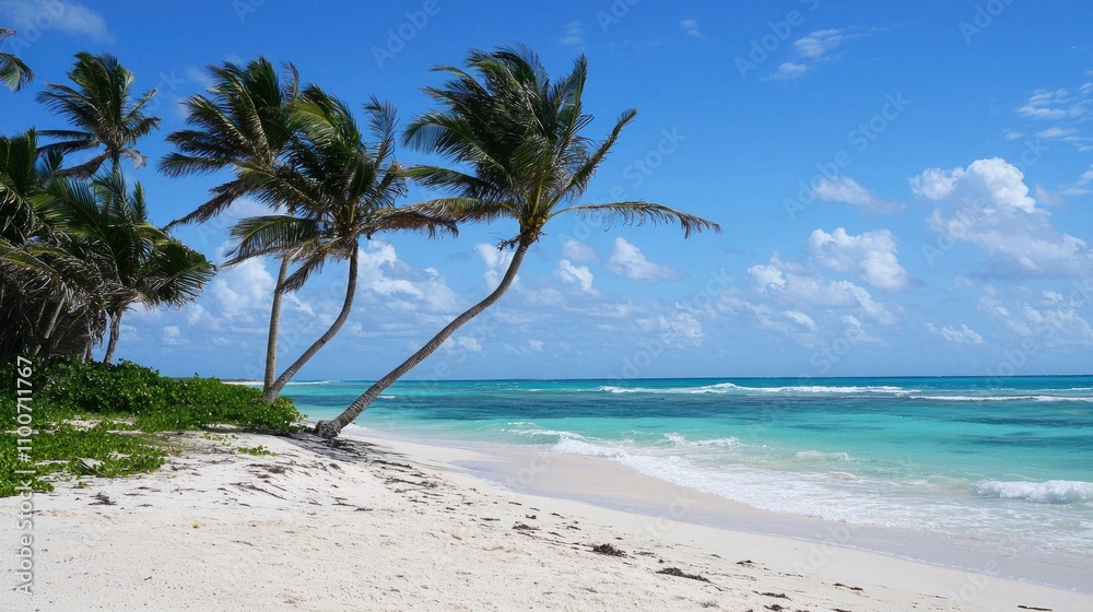 Fototapeta premium A tropical beach scene with turquoise water, white sand, and palm trees swaying in the warm breeze