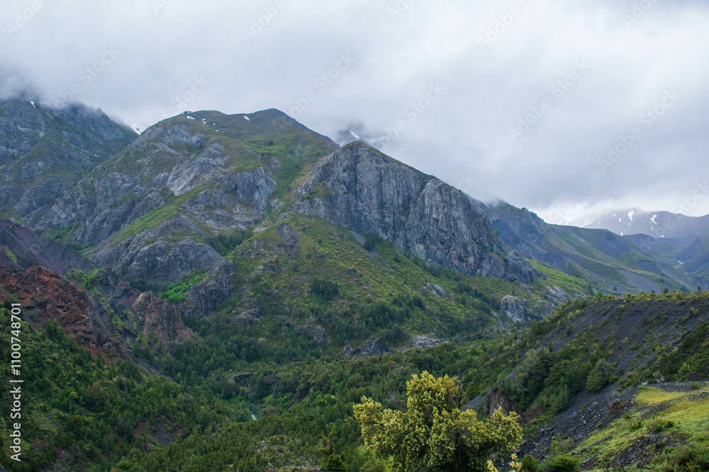 Naklejka premium mountain landscape with clouds