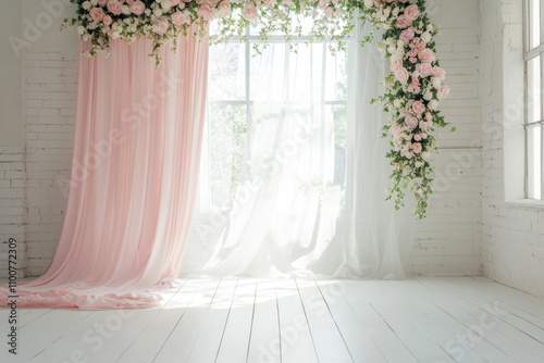 Elegant pink and white wedding backdrop with floral decorations, perfect for indoor ceremonies or photo shoots, creating romantic atmosphere