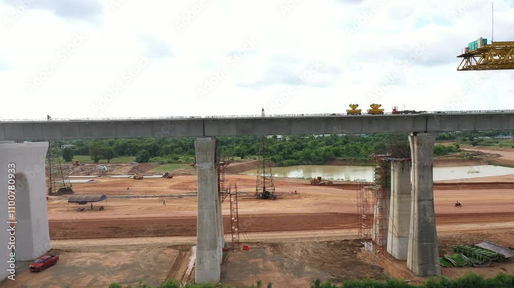 New construction site with crane and mechanical equipments on blue sky background, Infrastructure of high-speed train construction site of Chinese made FuxingHao, base from CR400AF for transportation.