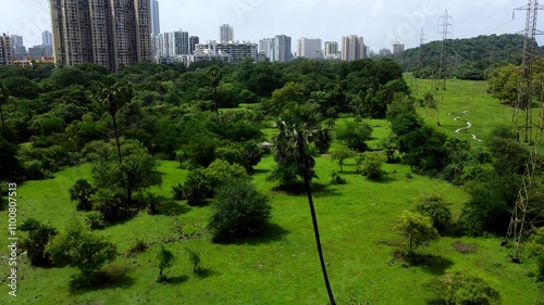 Drone footage of the Teenmurti Cricket Ground on a sunny day in Maharashtra, India photo