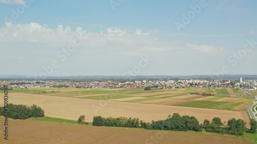 Stunning 4K drone video of a Slovenian city of Murska Sobota. Murska Sobota is the business and economic center of the Pomurje region. Video shows cityscape filmed in summer. photo