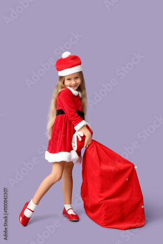 Cute little girl in Santa C...
