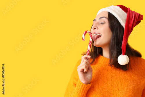 Happy young woman in Santa ...