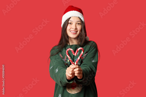 Young Asian woman in Santa ...