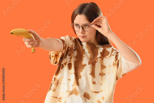 Young woman playing with ba...