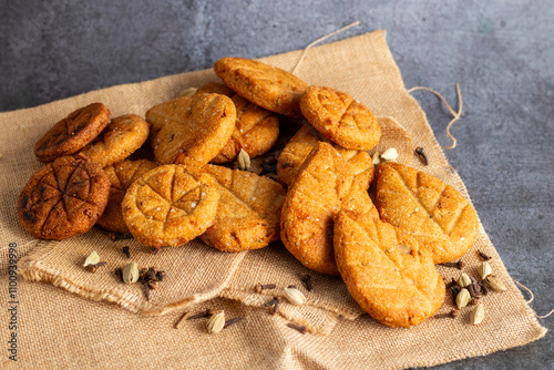 Thekua is a traditional sweet made from wheat flour, jaggery, and ghee, fried into crisp, golden discs, offered during Chhath Puja in Bihar and Uttar Pradesh. photo