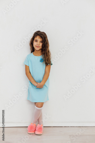 Little Curly Girl In Dress And Pink Slippers
