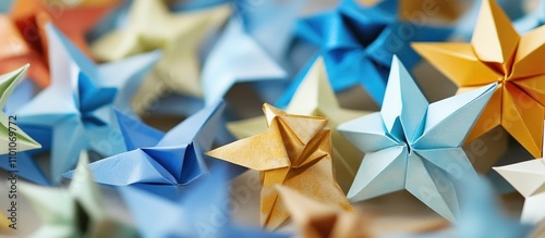 Colorful origami stars in various shades creating a vibrant and artistic background ideal for creative projects and decorative use. photo