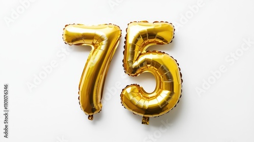 Shiny gold inflatable balloon in the shape of the number 75, perfect for celebrating anniversaries, birthdays, parties, and special events, isolated on white background. photo