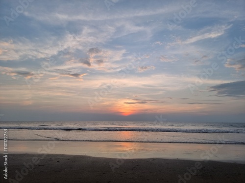 Arambol beach at sunset. View of the ocean and sky. Sea at evening sunset. India. Goa. High quality photo photo