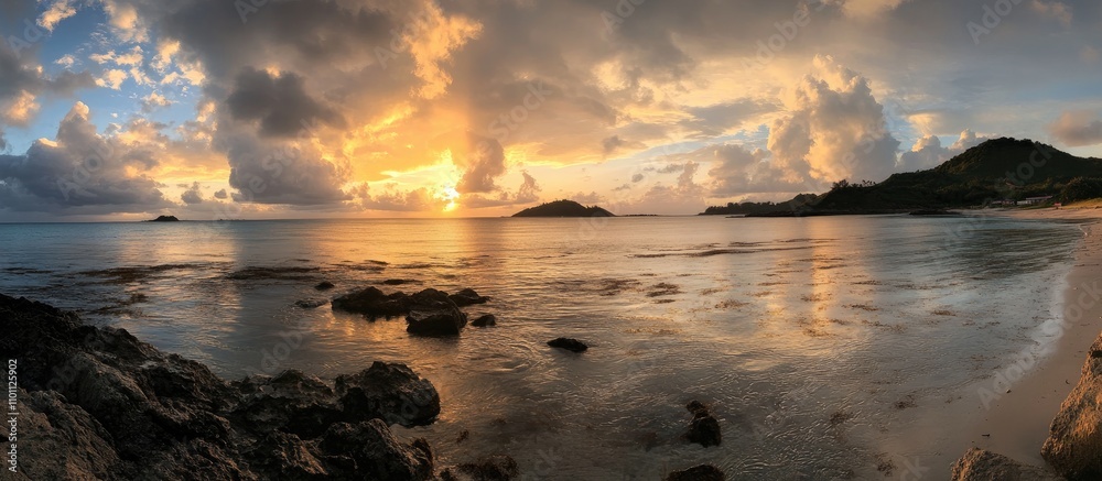 Obraz premium Breathtaking sunset seascape with vibrant colors reflecting on calm ocean waters at an island beach during golden hour
