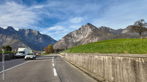 A scenic road through the Swiss Alps captures the essence of road trips, adventure, and European travel holidays  Dolomite Alps photo