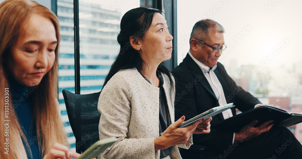 Obraz premium Japan, meeting and business people in office on tablet for planning, discussion and website research. Corporate, company and men and women on digital tech for negotiation, teamwork and collaboration