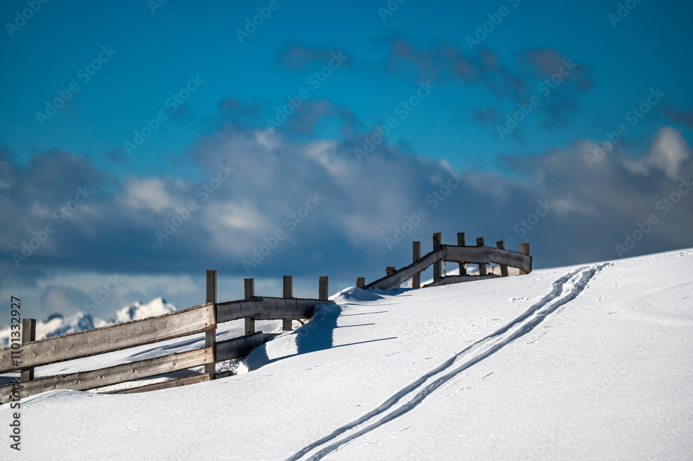 Fototapeta premium Discovering the Renon plateau in winter. Breathtaking views of the Dolomites.