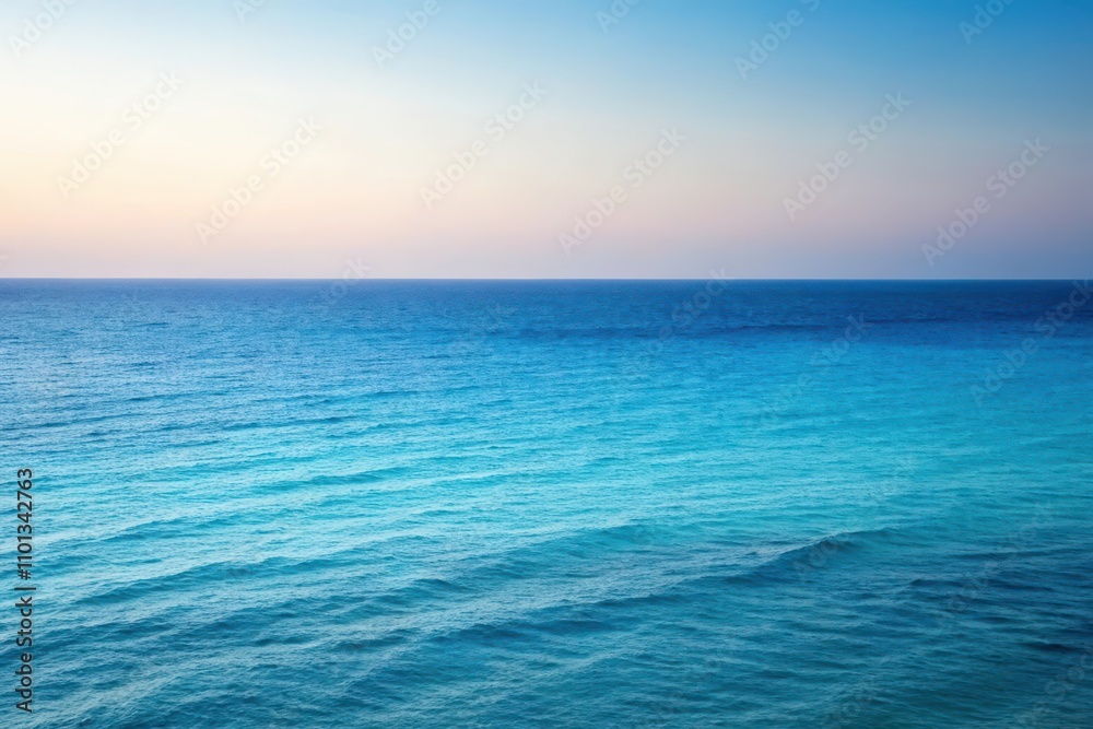 Fototapeta premium Serene Ocean Panorama A Tranquil View of Endless Azure Waters Under a Pastel Sky